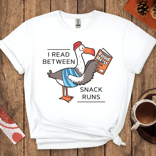 I Read Between Snack Runs Funny Seagull T-Shirt